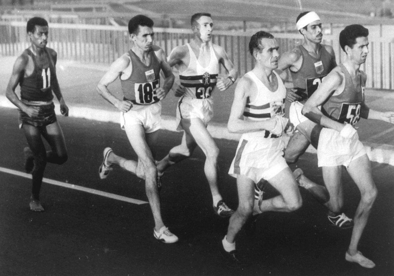 Abebe Bikila, the first black African to win gold at the Olympics in 1960 after running barefoot