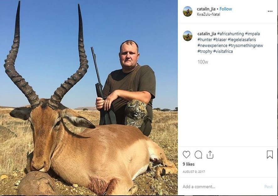 White couple kissing behind huge lion they&#039;ve killed during trophy hunting in South Africa sparks outrage