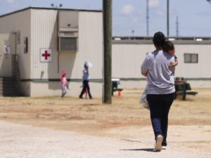 Federal lawyers urge a judge to dissolve the Flores settlement, a key safeguard for migrant children, as advocates warn of worsening detention conditions.