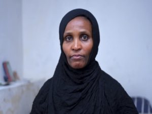 A migrant boat from Ethiopia capsized en route to Yemen, leaving over 130 missing. Families grieve as traffickers exploit desperate youth.