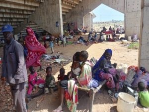 A drone attack incinerated 16 U.N. food trucks bound for North Darfur, worsening Sudan’s famine crisis as millions face acute hunger.