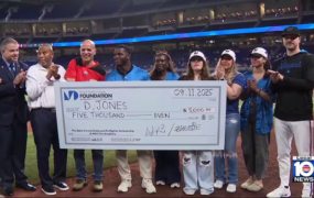 Aspiring fighter receives scholarship check from parents who lost child sharing same dream