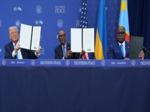President Donald Trump with Rwanda’s President Paul Kagame and Democratic Republic of Congo President Felix-Antoine Tshisekedi during a signing ceremony at the Donald J. Trump Institute of Peace on Thursday, Dec. 4, 2025, in Washington.