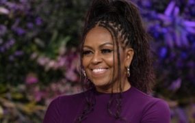 Michelle Obama reacts after Maryland students make videos asking her to speak at graduation