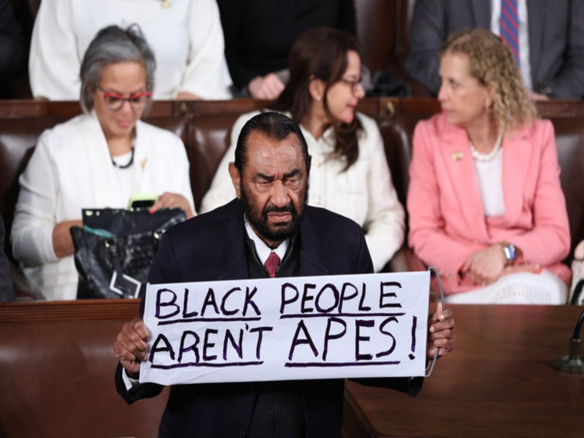 Rep. Al Green was removed from Congress after raising a protest sign as Trump entered, sparking chants and GOP backlash.