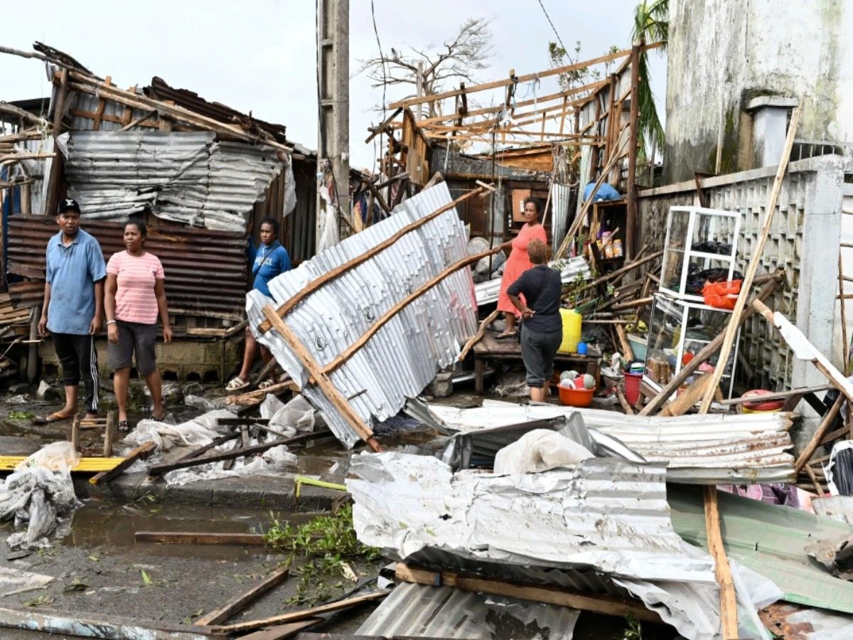 Residents assess the destruction caused by Cyclone Gezina in Toamasina, Madagascar, on Wednesday, Feb. 11, 2026.